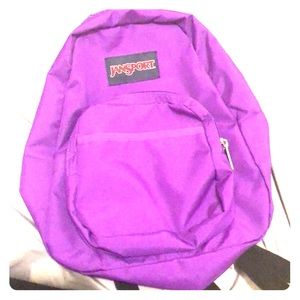 Half pint JanSport purple back bag